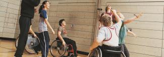 Students with disabilities playing basketball.