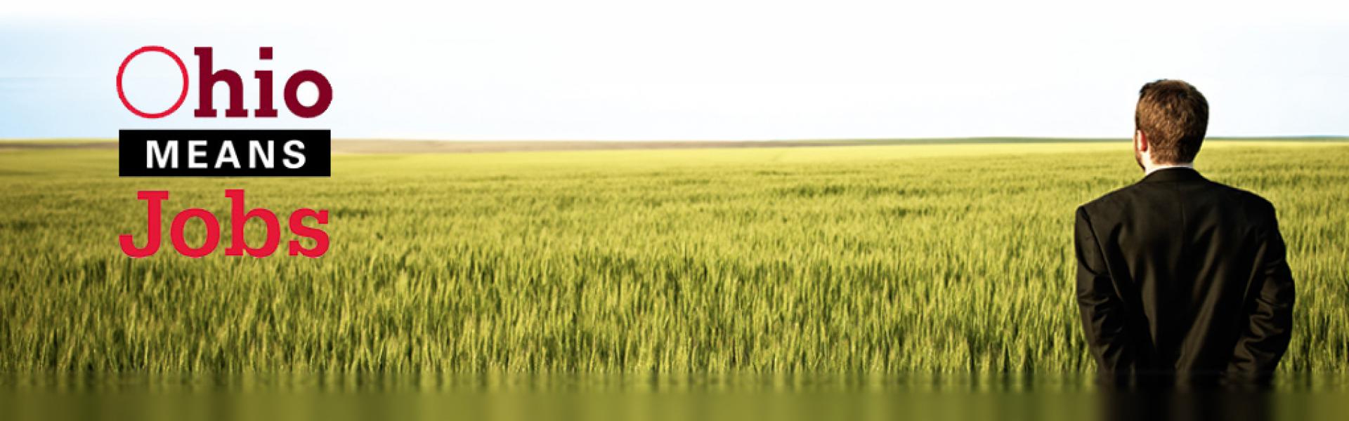 Ohio Means Jobs. A man looking out across a field.